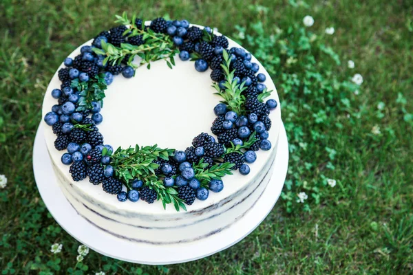 Summer berry cake with blueberries and blackberries