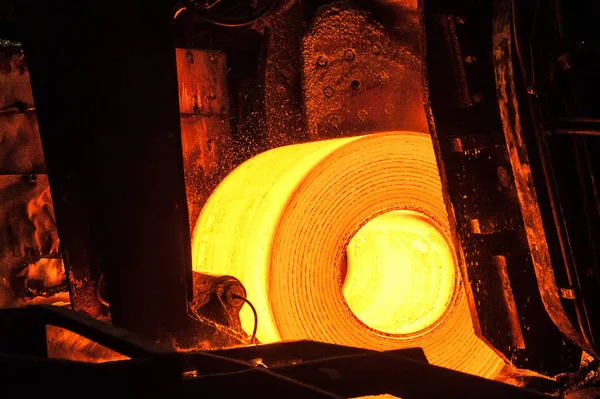 Roll of hot metal on the conveyor belt