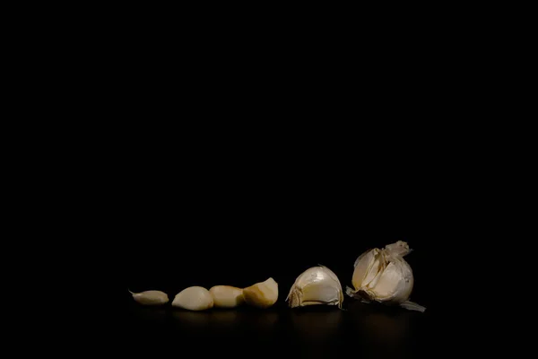 Closeup Peeled Garlic Black Background Free Copy — Stock Photo, Image