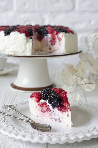 Cheesecake on agar with raspberries and blackberries