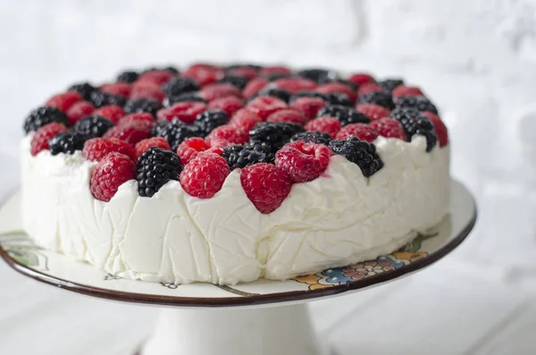 Cheesecake on agar with raspberries and blackberries