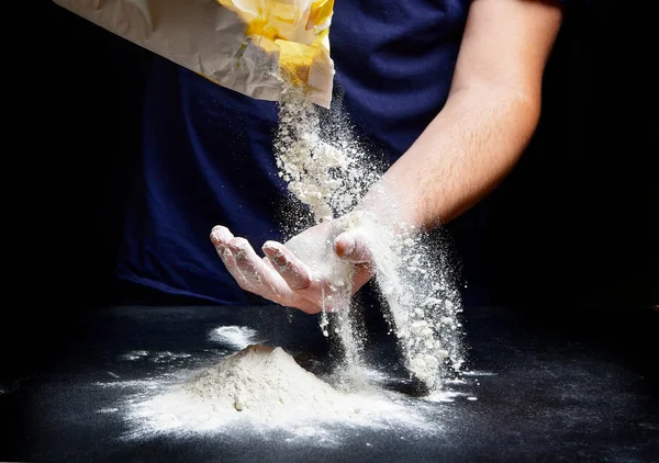 Baker Pours Flour His Hand — Stock Photo, Image