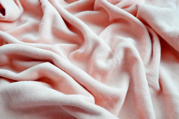 Warna batu karang latar belakang kain gelombang pakaian, bentuk spiral — Stok Foto