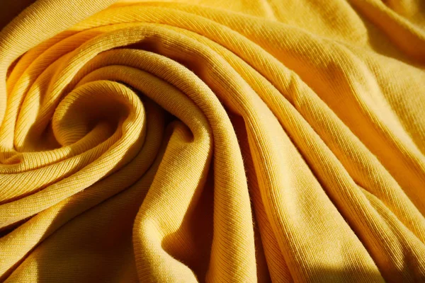 Kuning cerah wol pakaian gelombang latar belakang permukaan . — Stok Foto