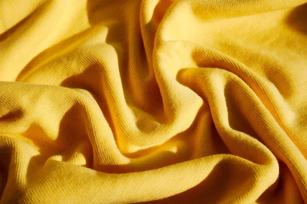Latar belakang gelombang pakaian tekstil kuning — Stok Foto