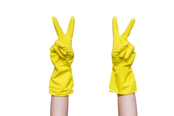 Woman Hands in yellow gloves symbolise la victoire — Photo