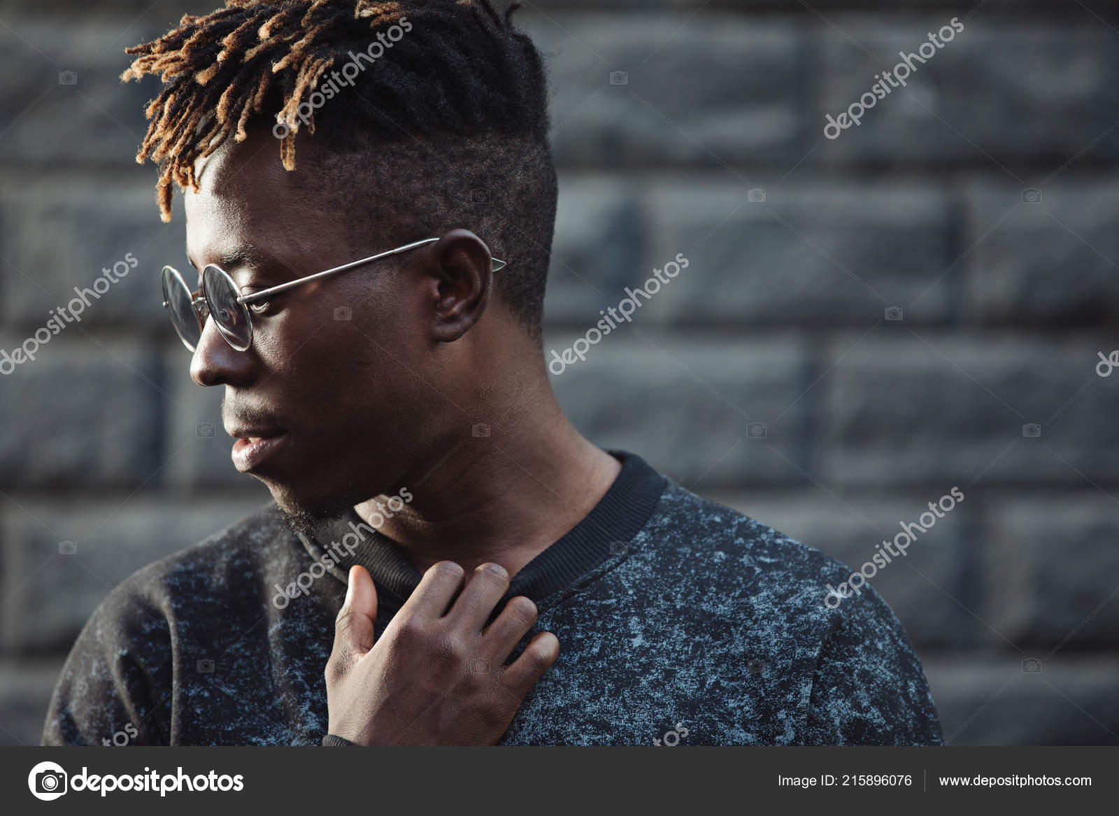 African Man Dreadlocks Hairstyle Wearing Modern Glasses