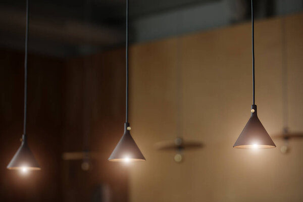 Glowing lamps in loft design interior