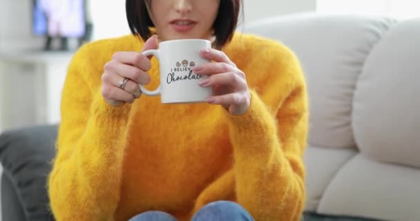 Woman drinking tea at home — Stock Video