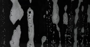 Siyah arka plan üzerine beyaz köpük doku