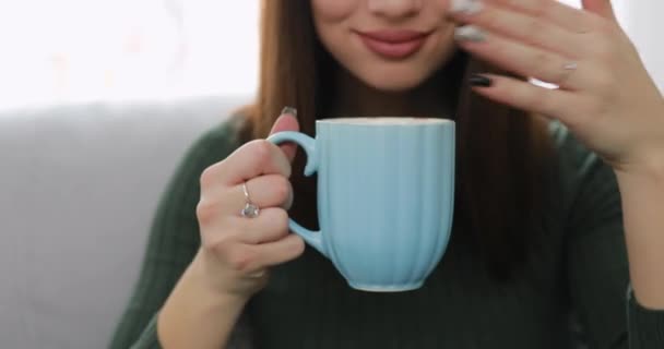 Woman drinking tea at home — Stock Video