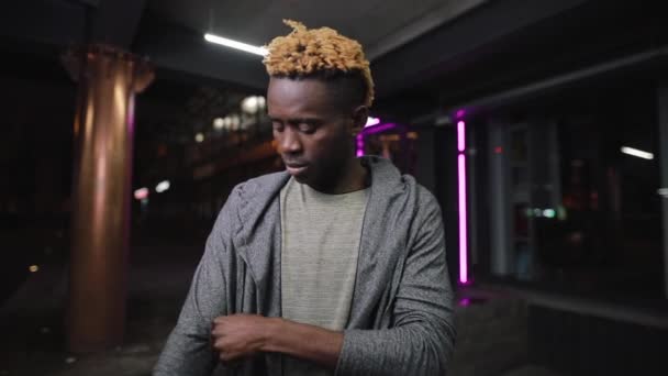 African american man in hoodie at underground tunnel — Stock Video