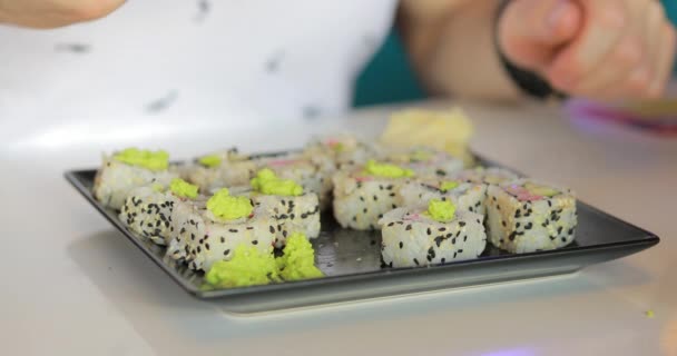 Macro video of man eating sushi — Stock Footage Macro video of man eating sushi Royalty Free Stock Footage