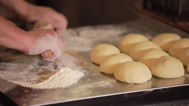 Chef roll the dough on a board — Stock Video