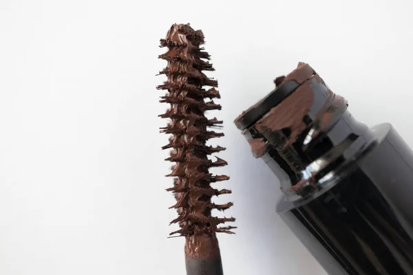 Brush brown mascara and tube isolated — Stock Photo, Image