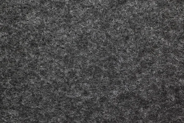 Närbild fibrösa filt konsistens. Grå och vit texturerad bakgrunds — Stockfoto