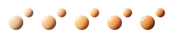 Sıvı temel ve makyaj astar rengi yatay afiş biçimi. Beyaz arkaplanda izole edilmiş BB kremi ya da CC krem damlası örnekleri