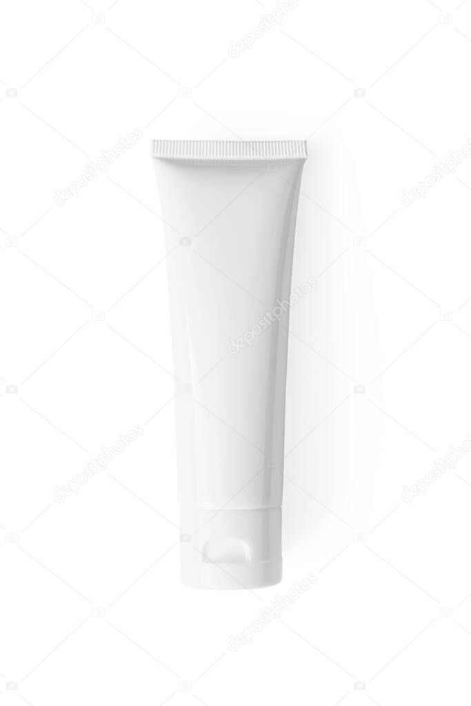 Moisturizer hand cream white plastic tube mockup isolated on white background, top view. Skincare routine, above. Blank body and health care beauty product packaging