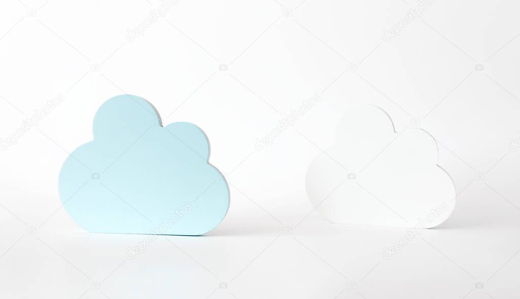 Cloud shape decor on white background. Minimalistic composition for showcase, product presentation with copy space. Scene stage for new product, promotion sale, cosmetic