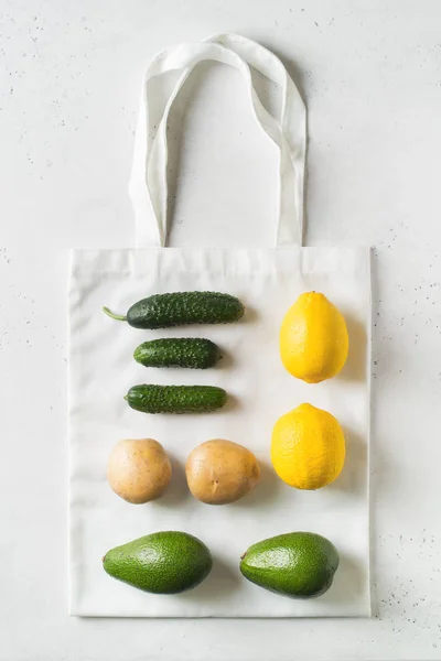 Zero waste concept. Textile ecologiical shopping bags with fruit