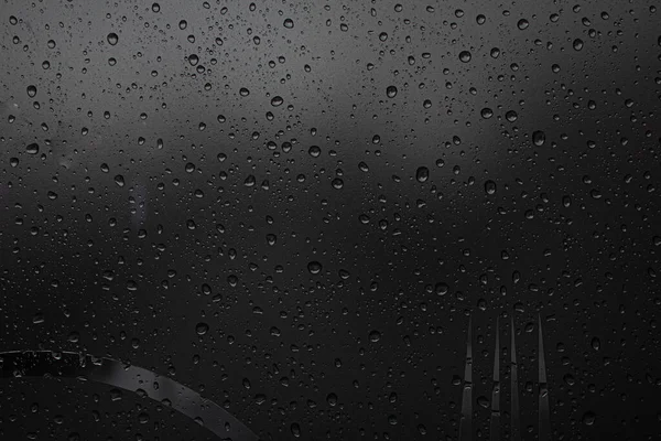 Raindrops on the glass. Raindrops on a sky background. Background. Texture.