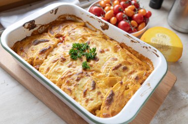 Delicious squash, minced meat casserole fresh and homemade cooked in a casserole dish