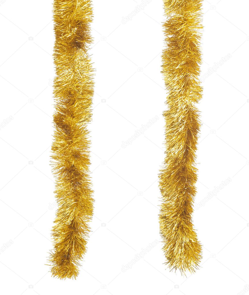 Two golden Christmas tinsels hanging in vertical position. Isolated on white background