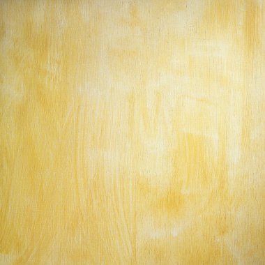 Tahta yüzey sarı renge boyanmış.