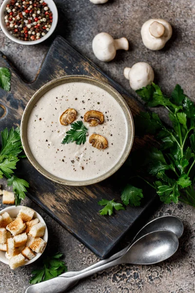 Yummy white mushroom cream soup with champignons on dark table — Stock Image Yummy White Mushroom Cream Soup Champignons Dark Table Royalty Free Stock Photos