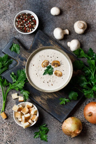 Yummy white mushroom cream soup with champignons on dark table — Stock Image Yummy White Mushroom Cream Soup Champignons Dark Table Royalty Free Stock Photos