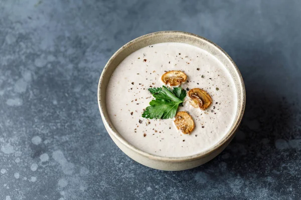 Yummy white mushroom cream soup with champignons on dark table — Stock Image Yummy White Mushroom Cream Soup Champignons Dark Table Stock Photo