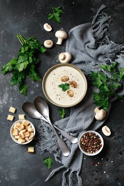 Yummy white mushroom cream soup with champignons on dark table — Stock Image Yummy White Mushroom Cream Soup Champignons Dark Table Royalty Free Stock Images