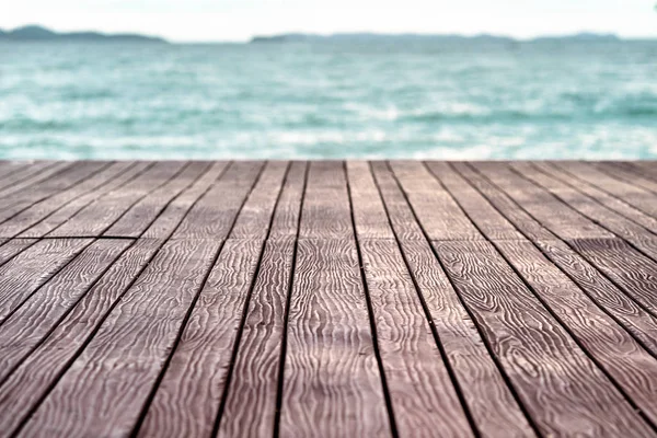 Background of Wooden Deck or Floor with Sea in Perspective