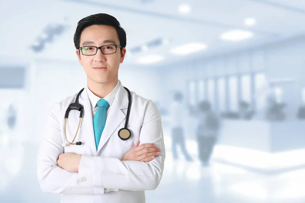 Doctor Posing Arms Crossed Medical Staff Working Blurry Background — Stock Photo, Image