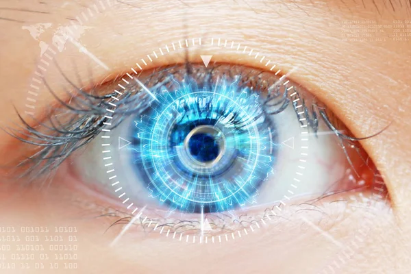 Close-up of woman's brown eye. High Technologies in the future — Stock Photo, Image