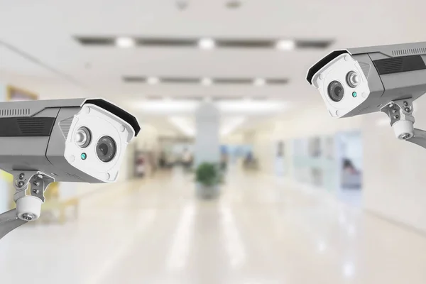 CCTV Security Camera operating in hospital on blur background.
