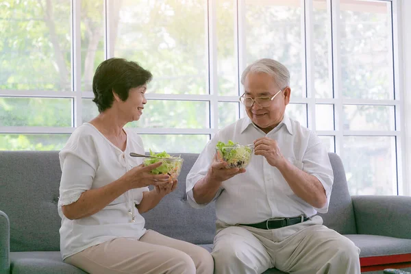 Smiling Asian Senior Man Woman Sitting Sofa Drinking Glasses Milk — Stock Photo, Image