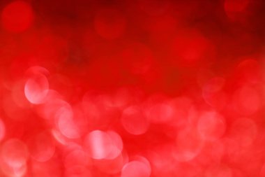 Işıklar ve pırıltılar ufuk bokeh canlı kırmızı arka plan bulanık