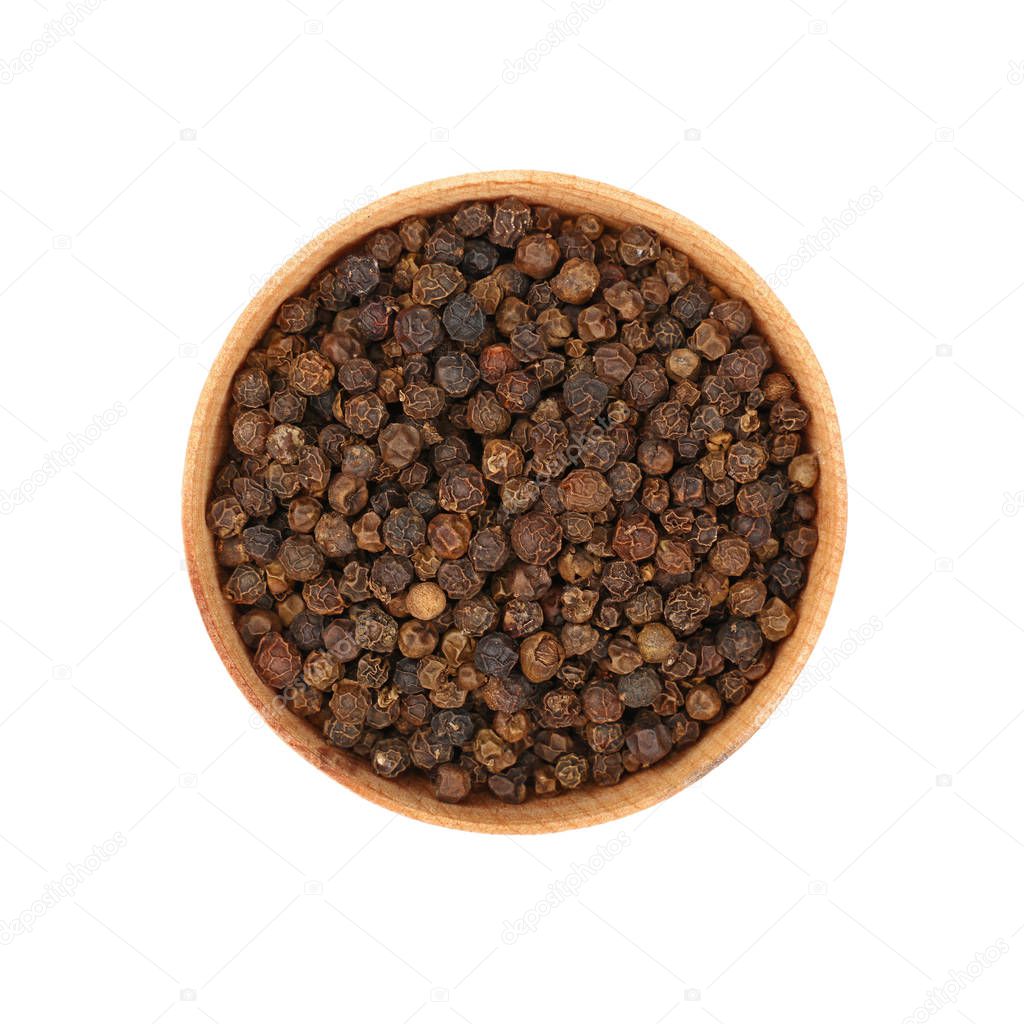 Close up one wooden bowl full of black pepper peppercorns isolated on white background, elevated top view, directly above