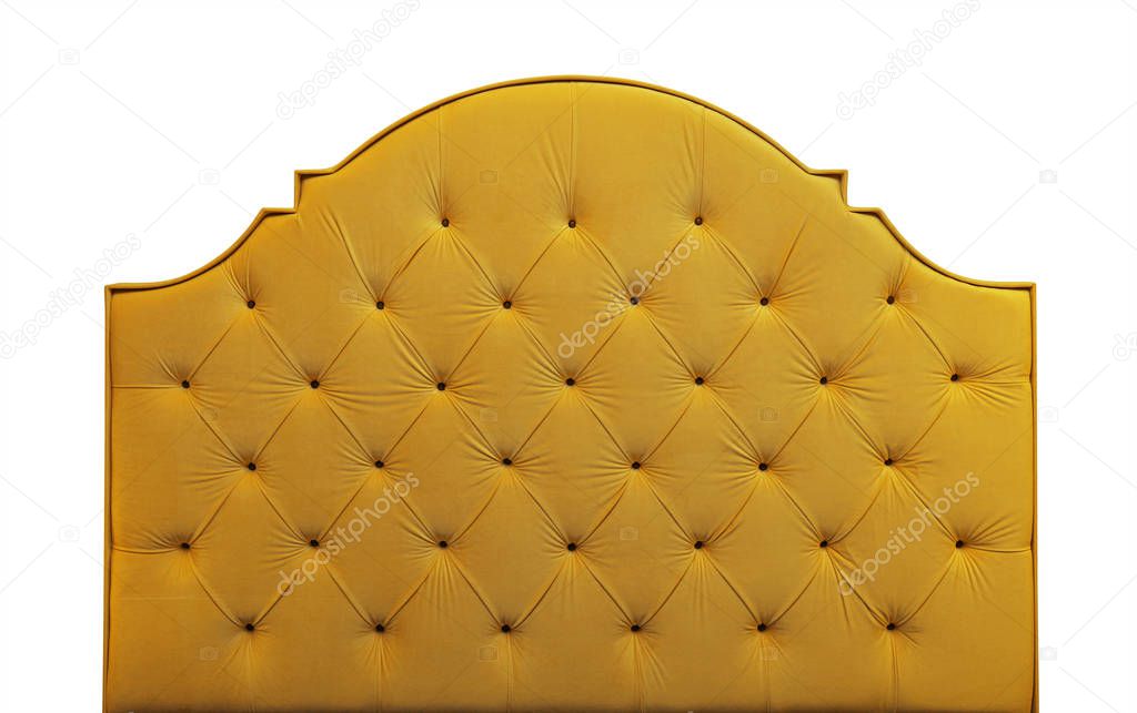 Shaped vivid yellow soft velvet fabric capitone bed headboard of Chesterfiels style sofa isolated on white background, front view
