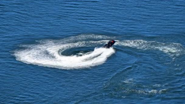 Cinemagraph One Man Riding Jet Ski Scooter Blue Sea Water Royalty Free Stock Video