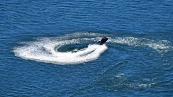 Cinemagraph One Man Riding Jet Ski Scooter Blue Sea Water — Stock Video