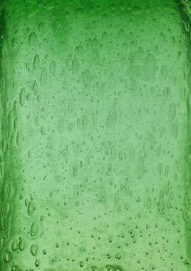 Katı, şeffaf yeşil renkli, hava kabarcıkları desenli cam arkaplan dokusu, kapat