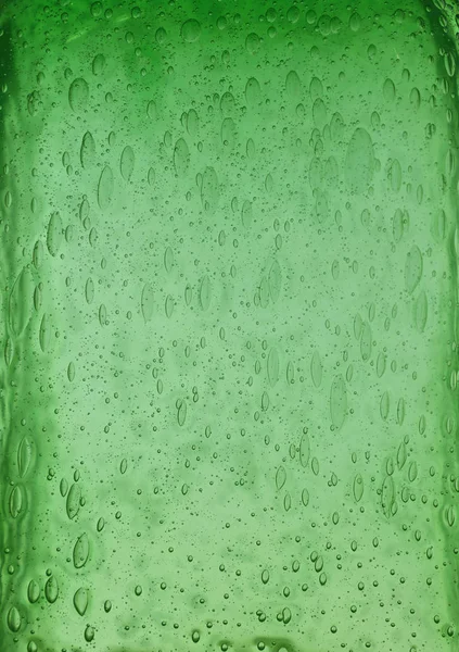 Katı, şeffaf yeşil renkli, hava kabarcıkları desenli cam arkaplan dokusu, kapat