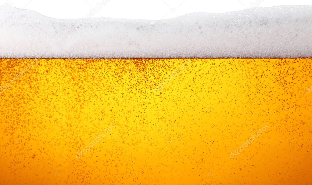 Close up background of beer with bubbles in glass