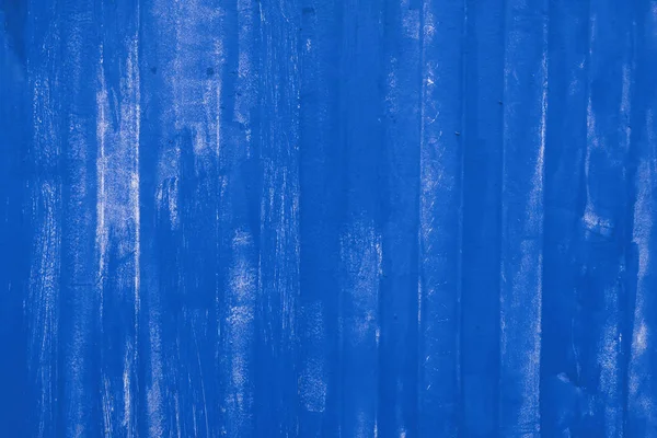 Superficie della parete metallica irregolare verniciata blu primo piano — Foto Stock