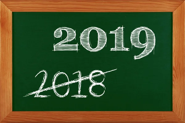 Green school chalkboard with 2019 sign