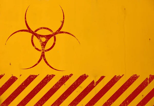 Sinal de perigo biológico vermelho sobre fundo amarelo — Fotografia de Stock
