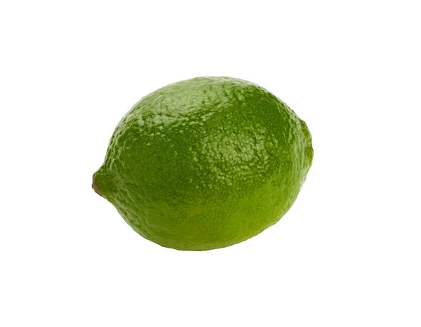 Feche um limão verde inteiro isolado em branco — Fotografia de Stock