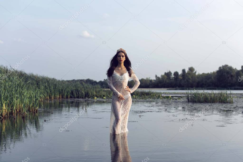 The girl in the forest near the river